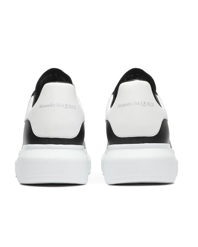 ALEXANDER MCQUEEN LARRY LEATHER SNEAKERS IN BLACK/WHITE